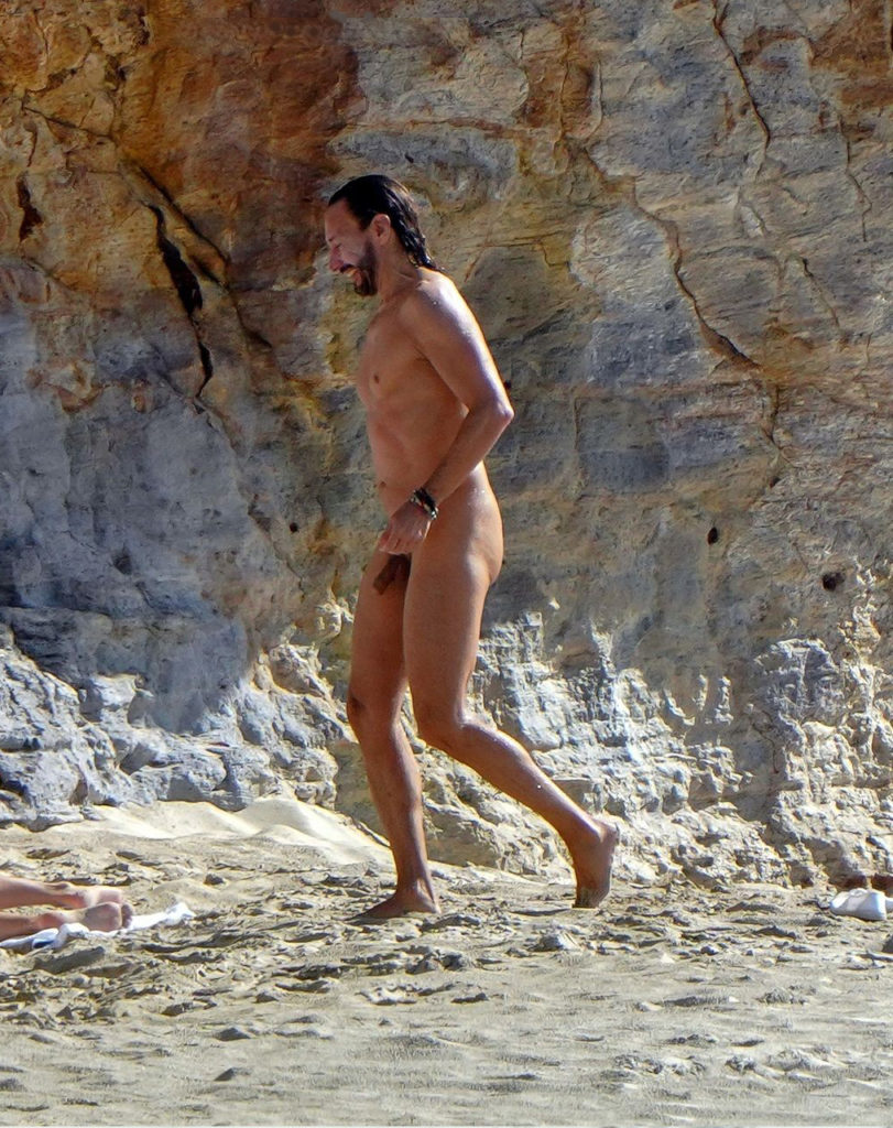 Famous DJ Bob Sinclar caught naked at the beach