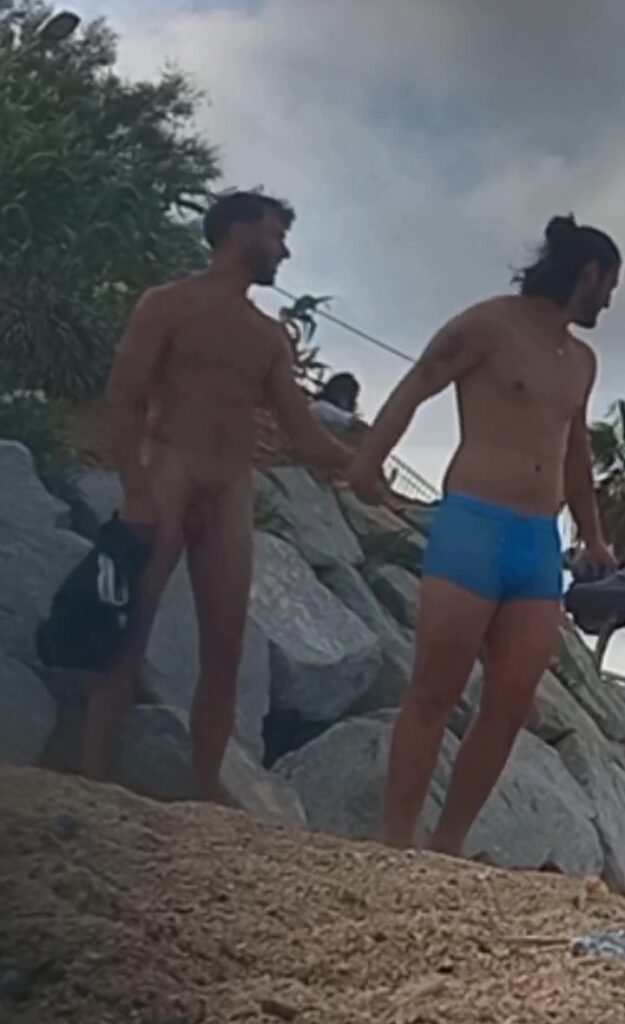 Nude-clothed boyfriends at the beach